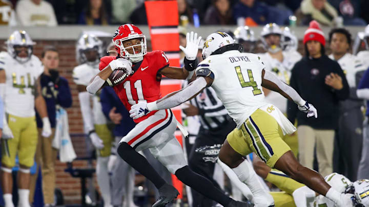Nov 25, 2023; Atlanta, Georgia, USA; Georgia Bulldogs wide receiver Arian Smith (11) runs after a catch against the Georgia Tech Yellow Jackets in the second half at Bobby Dodd Stadium at Hyundai Field. Mandatory Credit: Brett Davis-Imagn Images
Nov 25, 2023; Atlanta, Georgia, USA; Georgia Bulldogs wide receiver Arian Smith (11) runs after a catch against the Georgia Tech Yellow Jackets in the second half at Bobby Dodd Stadium at Hyundai Field. Mandatory Credit: Brett Davis-Imagn Images