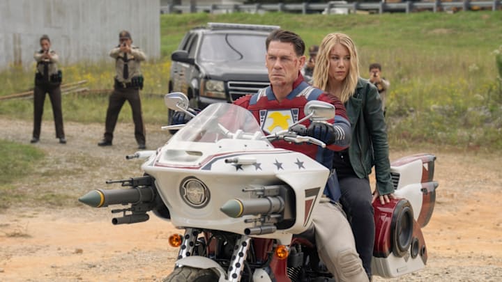 John Cena as Christopher Smith / Peacemaker and Jennifer Holland as Emilia Harcourt in Peacemaker season 2. (Courtesy of HBO Max).