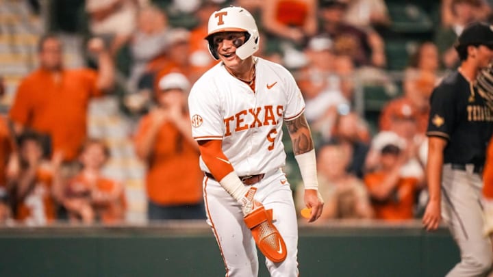 Texas Longhorns second baseman Ethan Mendoza celebrates after scoring against the Texas State Bobcats