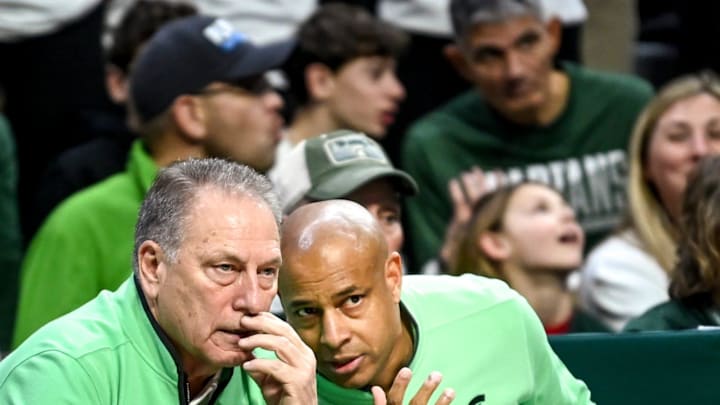 Michigan State assistant coach Mark Montgomery, right, talks with head coach Tom Izzo during the second half of the game against Rutgers on Sunday, Jan. 14, 2024, at the Breslin Center in East Lansing.