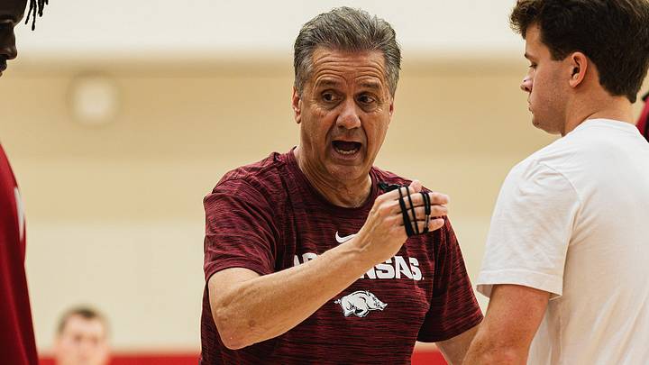 Arkansas men's basketball coach John Calipari teaches his players through a drill during the offseason.
