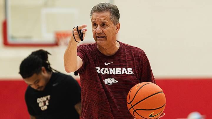 Arkansas men's basketball coach John Calipari instructs his team during a July practice. Arkansas men's basketball coach John Calipari instructs his team during a July practice.