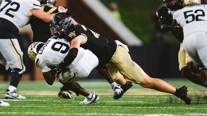 Wake Forest linebacker Vincent Firenze takes down Akron player Wake Forest linebacker Vincent Firenze takes down Akron player