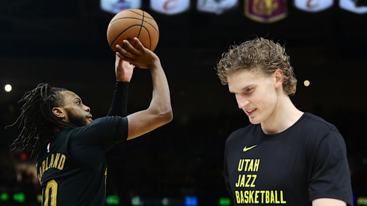Cleveland Cavaliers point guard Darius Garland and Utah Jazz power forward Lauri Markkanen last season.