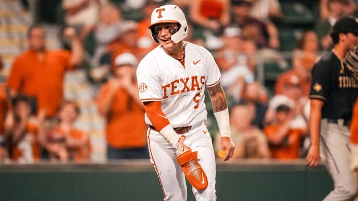 Texas Longhorns second baseman Ethan Mendoza celebrates after scoring against the Texas State Bobcats Texas Longhorns second baseman Ethan Mendoza celebrates after scoring against the Texas State Bobcats