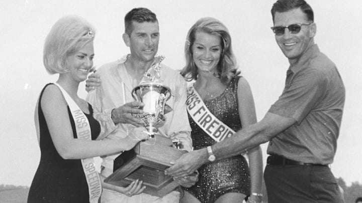Paul Goldsmith (second from the left)wins the 1966 NASCAR Cup Series event at Bristol. Paul Goldsmith (second from the left)wins the 1966 NASCAR Cup Series event at Bristol.