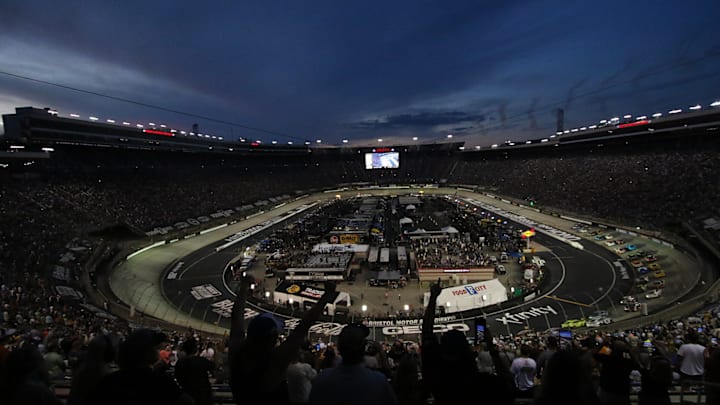 Fans cheer during the start of the 2024 NASCAR Cup Series Bass Pro Shops Night Race at Bristol Motor Speedway.