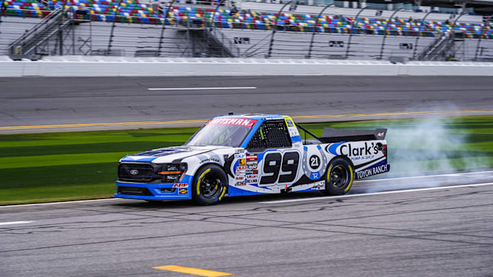Ben Rhodes smokes the tires on his No. 99 ThorSport Racing Ford F-150 prior to his qualifying run at Daytona International Speedway.