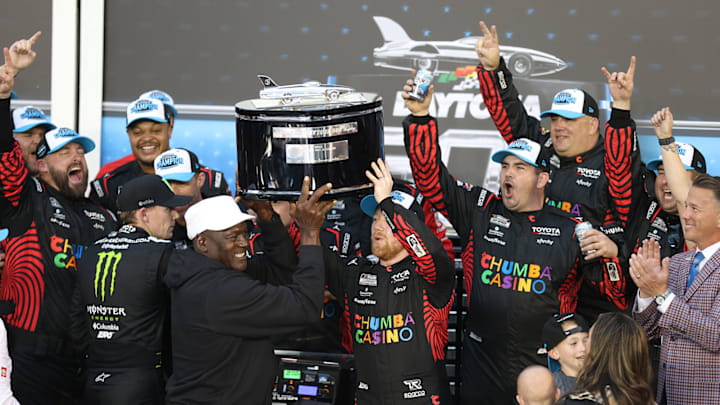 Tyler Reddick hoists the Harley J, Earl trophy with Michael Jordan after scoring the win in the 2026 Daytona 500. Tyler Reddick hoists the Harley J, Earl trophy with Michael Jordan after scoring the win in the 2026 Daytona 500.