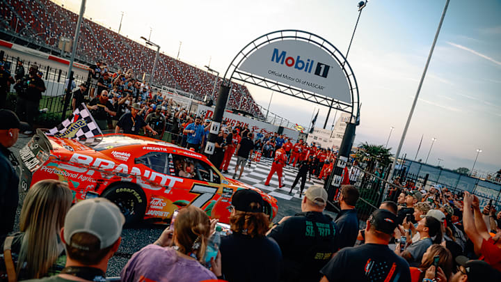 Justin Allgaier pulls into victory lane after winning the Sport Clips Haircuts VFW Help a Hero 200 at Darlington Raceway.