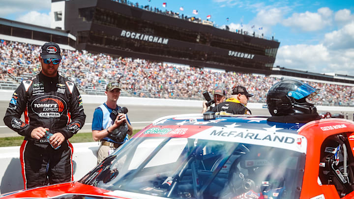 Cleetus McFarland looks over his No. 33 Richard Childress Racing Chevrolet at Rockingham Speedway.