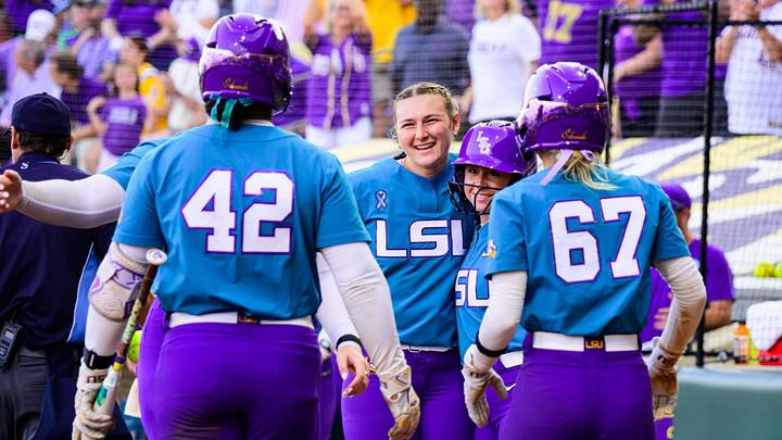 LSU infielder Kylee Edwards (right) joins a celebration with Tori Edwards (left). LSU infielder Kylee Edwards (right) joins a celebration with Tori Edwards (left).
