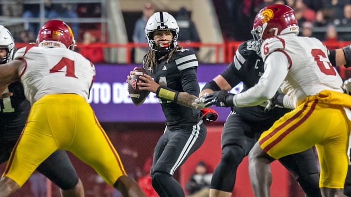 Nebraska quarterback TJ Lateef drops back to pass against USC. Nebraska quarterback TJ Lateef drops back to pass against USC.