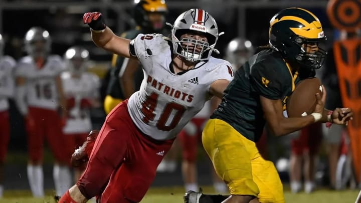 Fred J. Page defensive end Eric Hazzard