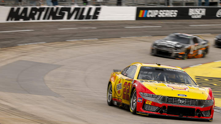 Joey Logano (22) leads Ross Chastain during the NASCAR Cup Series Cook Out 400 at Martinsville Speedway. Joey Logano (22) leads Ross Chastain during the NASCAR Cup Series Cook Out 400 at Martinsville Speedway.