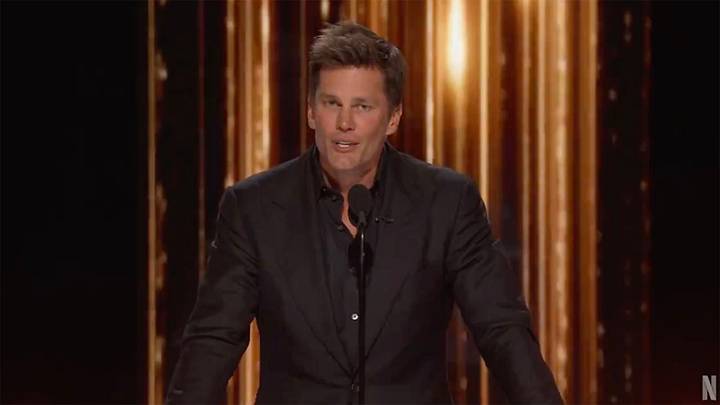 Tom Brady speaks during his roast on Netflix.