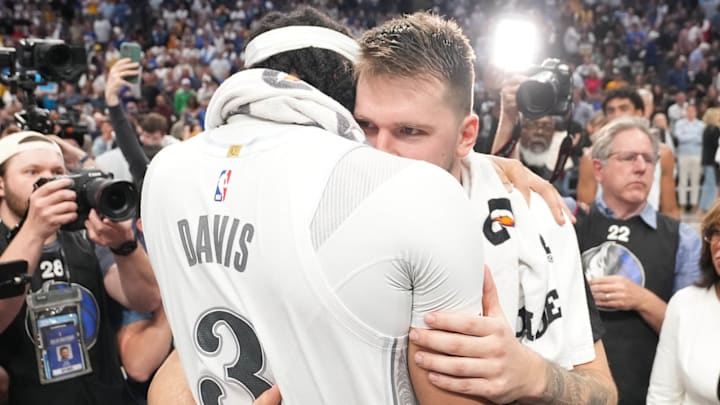 Davis and Doncic greet each other on the court following the Lakers' 112-97 win over the Mavs on Wednesday night.