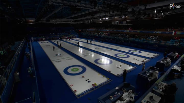 The first curling match was delayed due to a power outage.