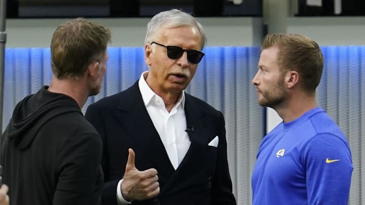 Jun 10, 2021; Los Angeles, CA, USA; Los Angeles Rams  owner Stan Stan Kroenke (center) talks to head coach Sean McVay (right) and head coach Les Snead during an  offseason workout at SoFi Stadium. Mandatory Credit: Robert Hanashiro-Imagn Images