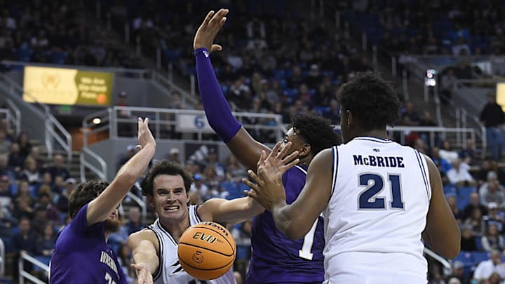 Nevada’s Nick Davidson looks to pass while taking on Washington at Lawlor Events Center in Reno on Nov. 9, 2024.
