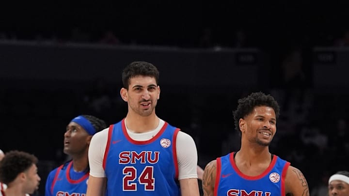 The Southern Methodist University Mustangs are represented by center Samet Yigitoglu and forward Corey Washington. Mandatory Credit: Jim Dedmon-Imagn Images