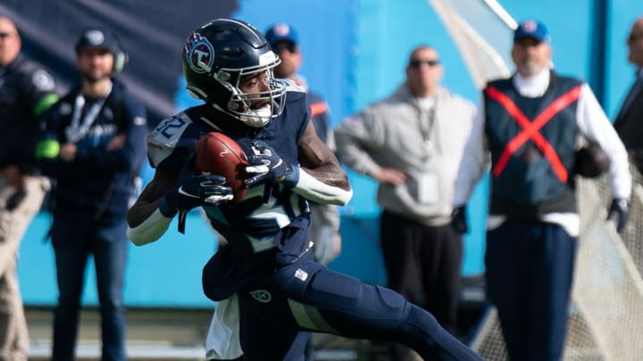 Tennessee Titans running back Tyjae Spears (32) fields the kickoff at the 15-yard line against the Indianapolis Colts during their game at Nissan Stadium in Nashville, Tenn., Sunday, Dec. 3, 2023.
