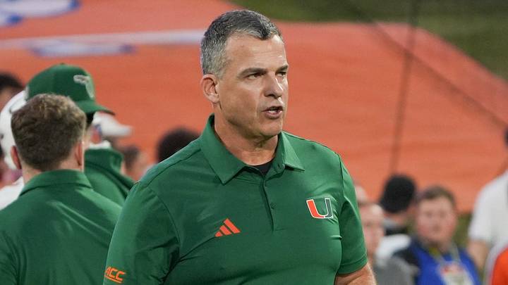 Miami Hurricanes Head Coach Mario Cristobal during warm up time before kickoff at Memorial Stadium in Clemson at Memorial Stadium Saturday, October 3, 2026. Miami Hurricanes Head Coach Mario Cristobal during warm up time before kickoff at Memorial Stadium in Clemson at Memorial Stadium Saturday, October 3, 2026.