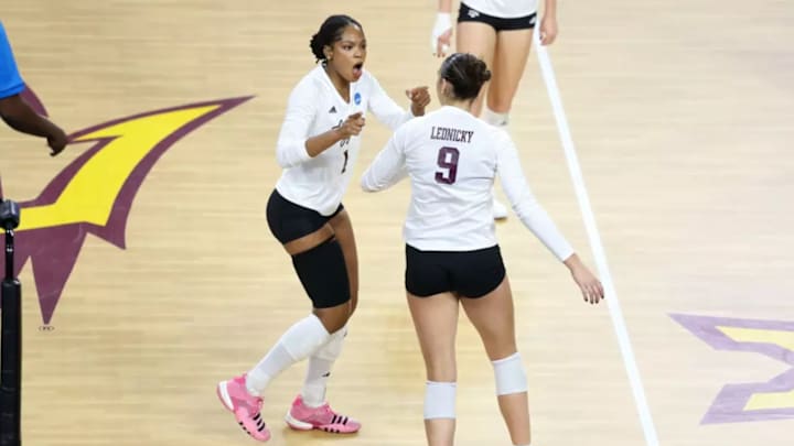 empe, Arizona - December 06, 2024 - Middle Blocker Ifenna Cos-Okpalla #1 of the Texas A&M Aggies and Opposite Hitter Logan Lednicky #9 of the Texas A&M Aggies during the game between the Colorado State Rams and the Texas A&M Aggies at Desert Financial Arena in Tempe, Arizona. Photo By Evan PilatPhoto by Evan Pilat/Texas A&M Athletics