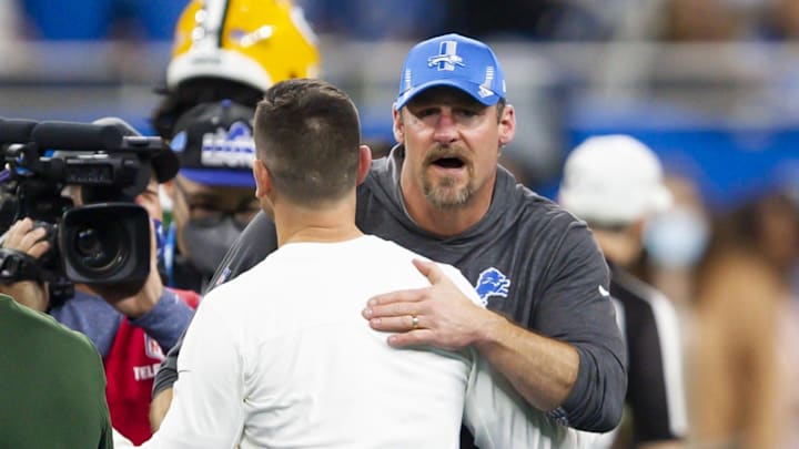 Jan 9, 2022; Detroit, Michigan, USA; Detroit Lions head coach Dan Campbell hugs Green Bay Packers head coach Matt LaFleur after the game at Ford Field. Mandatory Credit: Raj Mehta-Imagn Images