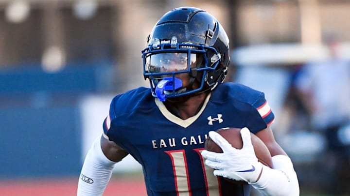 Xavier Lherisse of Eau Gallie runs the ball during the Kickoff Classic game against Mainland Friday, August 16, 2024.