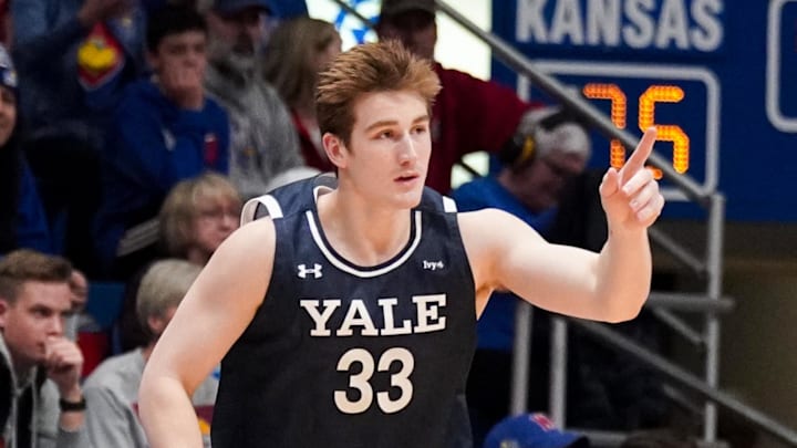 Dec 22, 2023; Lawrence, Kansas, USA; Yale Bulldogs forward Jack Molloy (33) celebrates after scoring