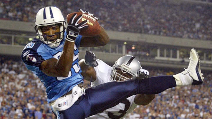 No. 8-Derrick Mason: Tennessee Titans receiver Mason catches a pass for a touchdown against the Oakland Raiders during the fourth quarter at the Coliseum Sept. 7, 2003.

Titans Vs Raiders
