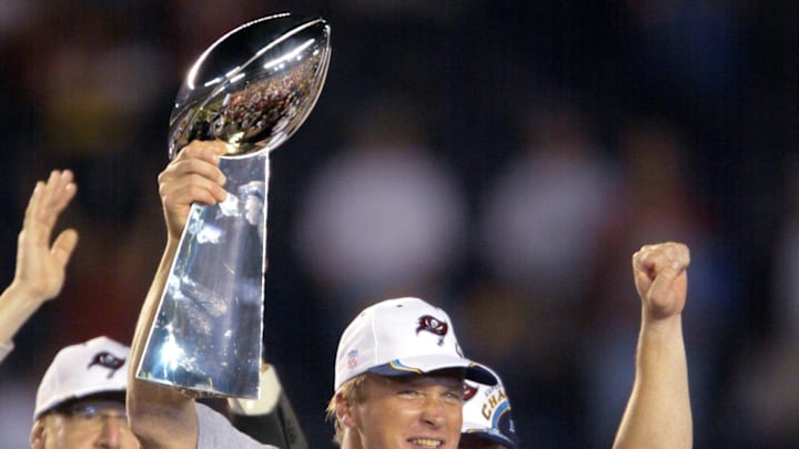 Tampa Bay Buccaneers head coach Jon Gruden holds up the Vince Lombardi Trophy after winning Super Bowl XXXVIII against the Oakland Raiders at Qualcomm Stadium in San Diego, CA on Jan. 26, 2003. 