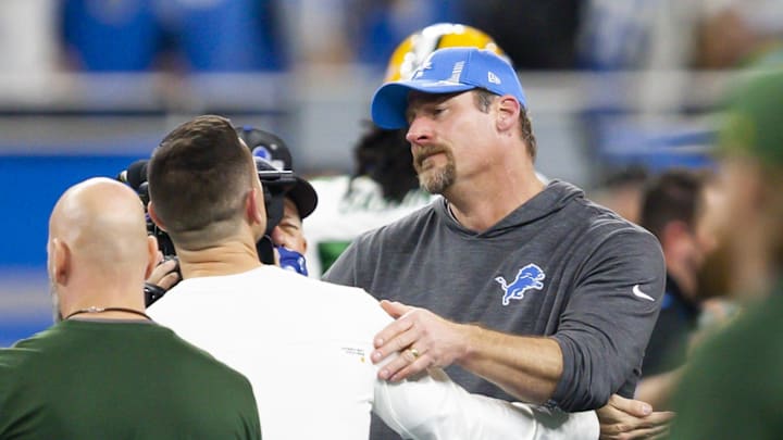 Jan 9, 2022; Detroit, Michigan, USA; Detroit Lions head coach Dan Campbell talks with Green Bay Packers head coach Matt LaFleur after the game at Ford Field. Mandatory Credit: Raj Mehta-Imagn Images