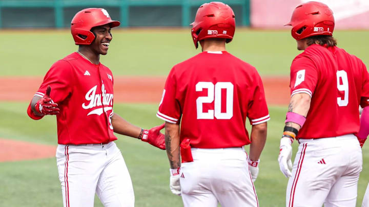 Indiana outfielder Devin Taylor (far left) is greeted by teammates Korbyn Dickerson (20) and Jake Stadler (9) during the weekend series against Maryland at Bart Kaufman Field.