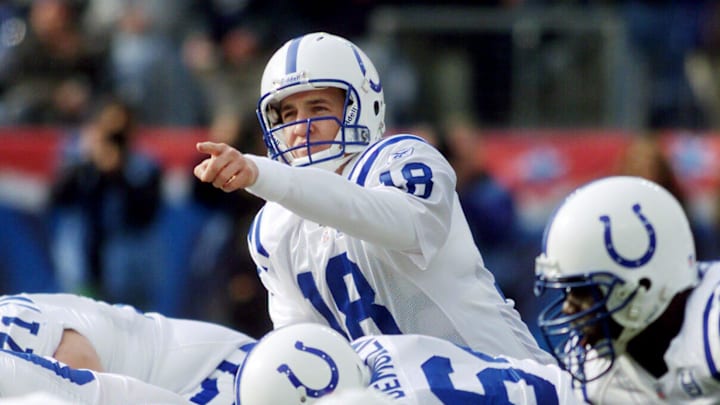 Indianapolis Colts quarterback Peyton Manning (18) looks over the defense of the Tennessee Titans during their game at The Coliseum in Nashville on Dec. 8, 2002.