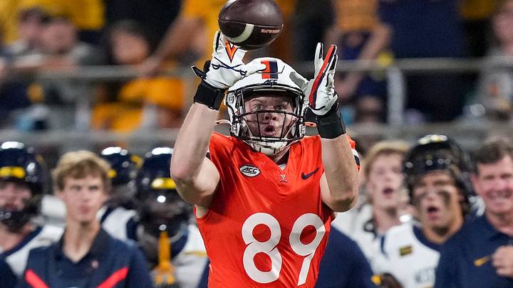 Sep 19, 2026; Charlotte, North Carolina, USA; Virginia Cavaliers tight end John Rogers (89) catches a pass near the sideline during the second half against the West Virginia Mountaineers at Bank of America Stadium. Mandatory Credit: Jim Dedmon-Imagn Images Sep 19, 2026; Charlotte, North Carolina, USA; Virginia Cavaliers tight end John Rogers (89) catches a pass near the sideline during the second half against the West Virginia Mountaineers at Bank of America Stadium. Mandatory Credit: Jim Dedmon-Imagn Images