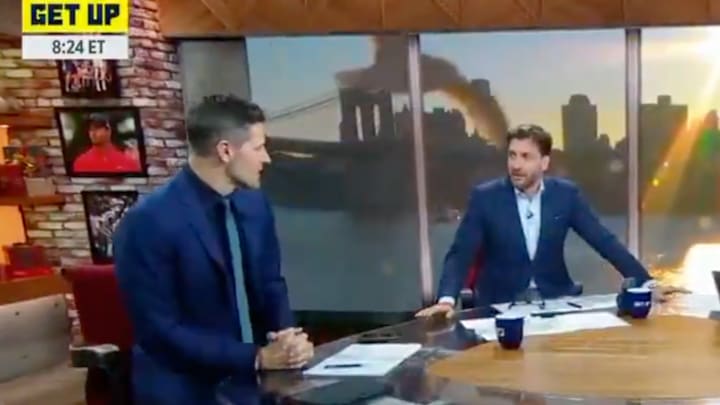 From left to right: Dan Orlovsky, a bird and Mike Greenberg on Get Up. 