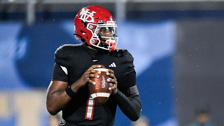 Champ Monds (1) of Vero Beach looks to pass in the FHSAA Class 7A state championship, Dec. 13, 2025, at Pitbull Stadium in Miami.