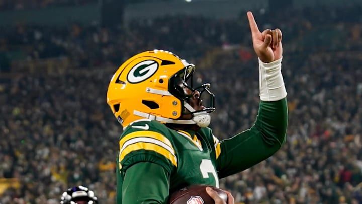 Dec 27, 2025; Green Bay, Wisconsin, USA; Green Bay Packers quarterback Malik Willis (2) celebrates after a touchdown during the second quarter against the Baltimore Ravens at Lambeau Field. Mandatory Credit: Kayla Wolf-Imagn Images