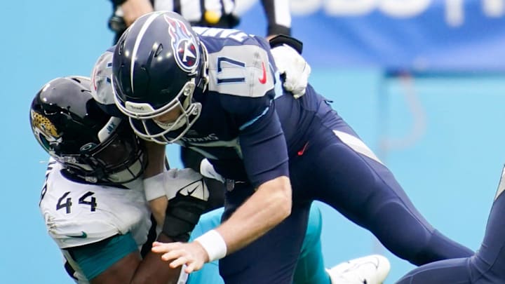 Tennessee Titans quarterback Ryan Tannehill (17) fumbles the ball as he is sacked by Jacksonville Jaguars linebacker Travon Walker (44) during the first quarter at Nissan Stadium Sunday, Dec. 11, 2022, in Nashville, Tenn.
Nfl Jacksonville Jaguars At Tennessee Titans Tennessee Titans quarterback Ryan Tannehill (17) fumbles the ball as he is sacked by Jacksonville Jaguars linebacker Travon Walker (44) during the first quarter at Nissan Stadium Sunday, Dec. 11, 2022, in Nashville, Tenn.
Nfl Jacksonville Jaguars At Tennessee Titans