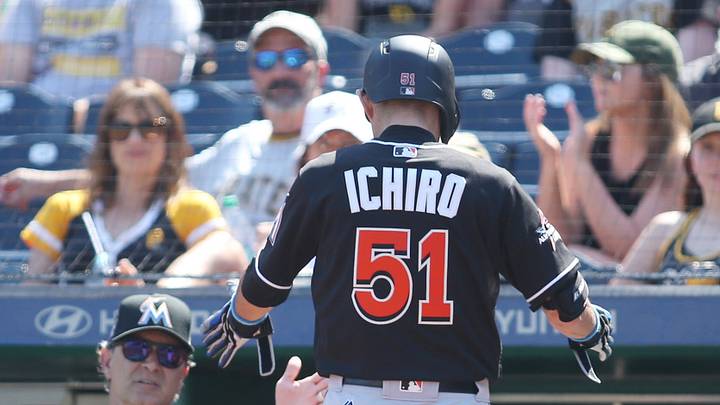 Miami Marlins manager Don Mattingly greets right fielder Ichiro Suzuki at the dugout after Ichiro hit a solo home run Miami Marlins manager Don Mattingly greets right fielder Ichiro Suzuki at the dugout after Ichiro hit a solo home run