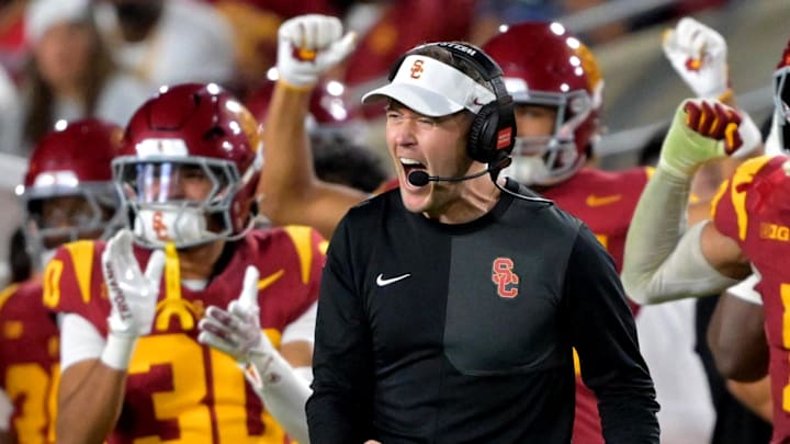 Oct 11, 2025; Los Angeles, California, USA;  USC Trojans head coach Lincoln Riley celebrates after kicker Ryon Sayeri (48) hit a 54-yard field goal in the second half against the Michigan Wolverines at United Airlines Field at the Los Angeles Memorial Coliseum. Mandatory Credit: Jayne Kamin-Oncea-Imagn Images