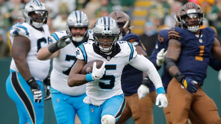 Carolina Panthers running back Rico Dowdle (5) breaks away for a long gain with less than a minute left in the game against the Green Bay Packers during their football game Sunday, November 2, 2025, at Lambeau Field in Green Bay, Wisconsin. Carolina won 16-13.
