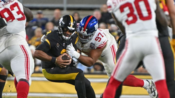 Oct 28, 2024; Pittsburgh, Pennsylvania, USA; New York Giants defensive tackle Dexter Lawrence II (97) sacks Pittsburgh Steelers quarterback Russell Wilson (3) during the second quarter at Acrisure Stadium. | Oct 28, 2024; Pittsburgh, Pennsylvania, USA; New York Giants defensive tackle Dexter Lawrence II (97) sacks Pittsburgh Steelers quarterback Russell Wilson (3) during the second quarter at Acrisure Stadium. |