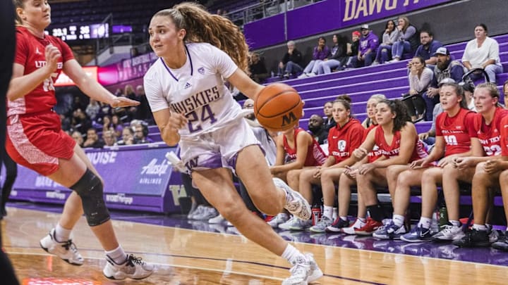 Washington guard Ellie Ladine drives with the basketball during a game at Hec Edmundson Pavilion in Seattle.