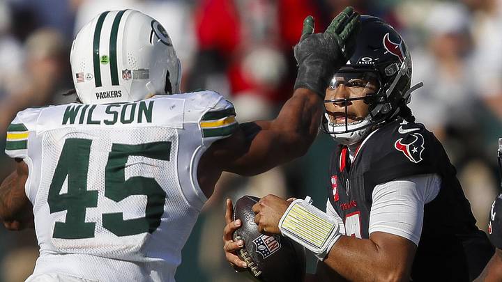 Oct 20, 2024; Green Bay, Wisconsin, USA; Houston Texans quarterback C.J. Stroud (7) takes a sack by Green Bay Packers linebacker Eric Wilson (45) at Lambeau Field . Mandatory Credit: Tork Mason/Green Bay Press-Gazette via the USA TODAY NETWORK-Wisconsin-Imagn Images Oct 20, 2024; Green Bay, Wisconsin, USA; Houston Texans quarterback C.J. Stroud (7) takes a sack by Green Bay Packers linebacker Eric Wilson (45) at Lambeau Field . Mandatory Credit: Tork Mason/Green Bay Press-Gazette via the USA TODAY NETWORK-Wisconsin-Imagn Images