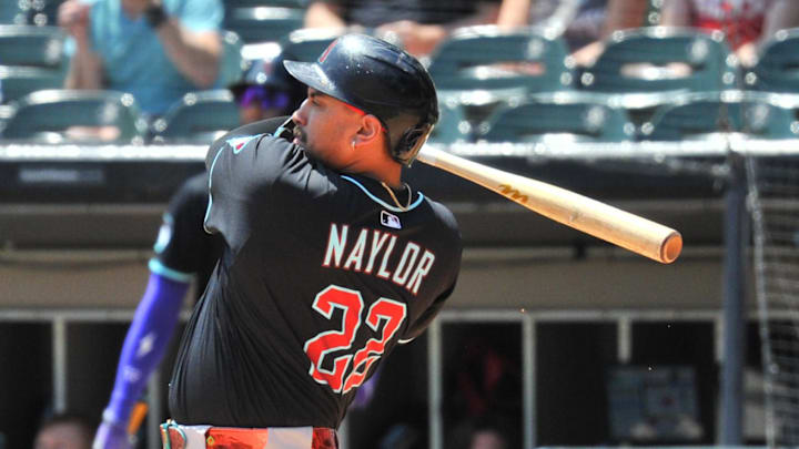 Arizona Diamondbacks first baseman Josh Naylor (22) hits a two-run home run during the first inning against the Chicago White Sox at Rate Field. 
