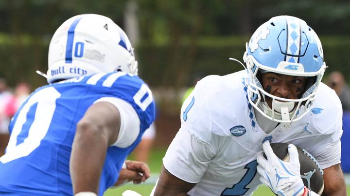 Oct 17, 2026; Durham, North Carolina, USA; North Carolina Tar Heels wide receiver Jordan Shipp (1) runs the ball against Duke Blue Devils cornerback Dylan Flowers (0) during the first quarter at Wallace Wade Stadium. Mandatory Credit: Zachary Taft-Imagn Images Oct 17, 2026; Durham, North Carolina, USA; North Carolina Tar Heels wide receiver Jordan Shipp (1) runs the ball against Duke Blue Devils cornerback Dylan Flowers (0) during the first quarter at Wallace Wade Stadium. Mandatory Credit: Zachary Taft-Imagn Images