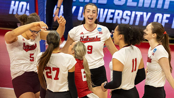 The Huskers celebrate a point during their sweep against Kansas in the regional semifinal. Nebraska hit .450 and moves on to face Texas A&M in the regional final on Sunday. The Huskers celebrate a point during their sweep against Kansas in the regional semifinal. Nebraska hit .450 and moves on to face Texas A&M in the regional final on Sunday.